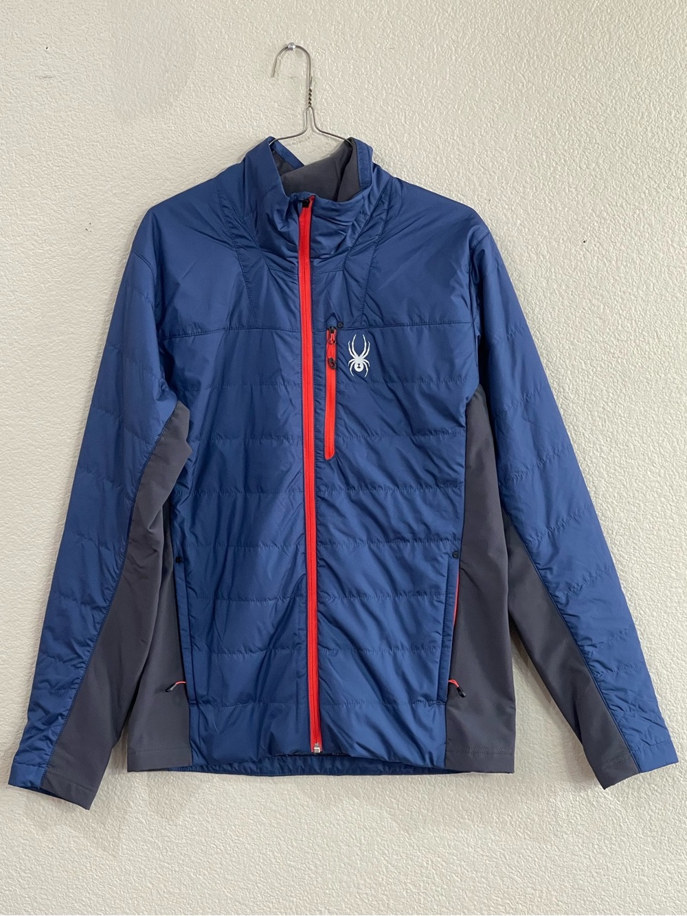 Spyder  Glissade Men's Navy Blue Insulated Hybrid Jacket with Red Zipper